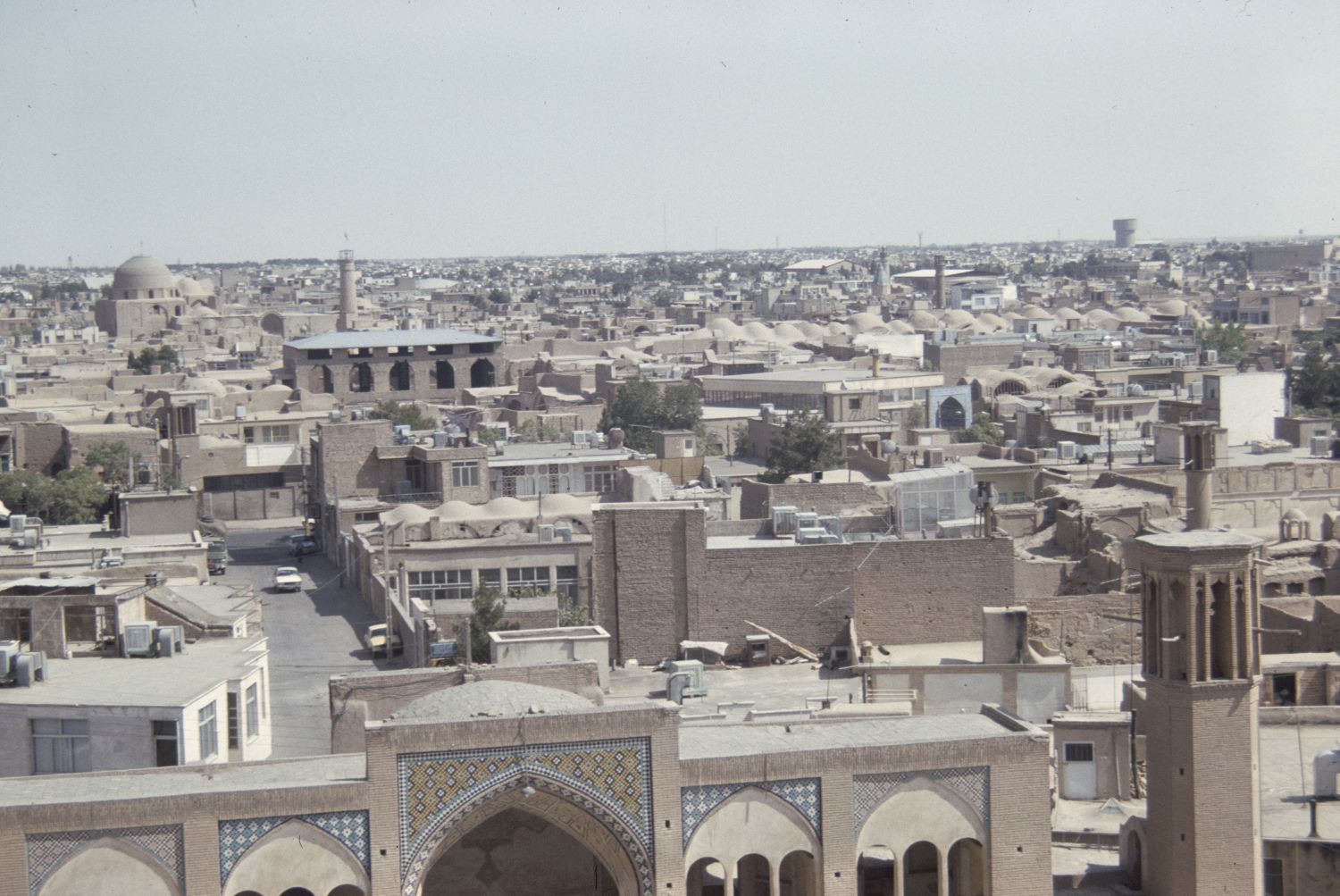 View over city facing north from the roof of the&nbsp;<a href="https://archnet.org/sites/1625" target="_blank" data-bypass="true">Aqa Buzurg Mosque</a>. Main entrance to mosque is visible in foreground.&nbsp;