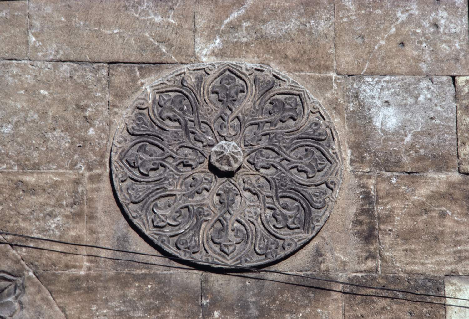 Exterior of entry portal, detail of decorative medallion