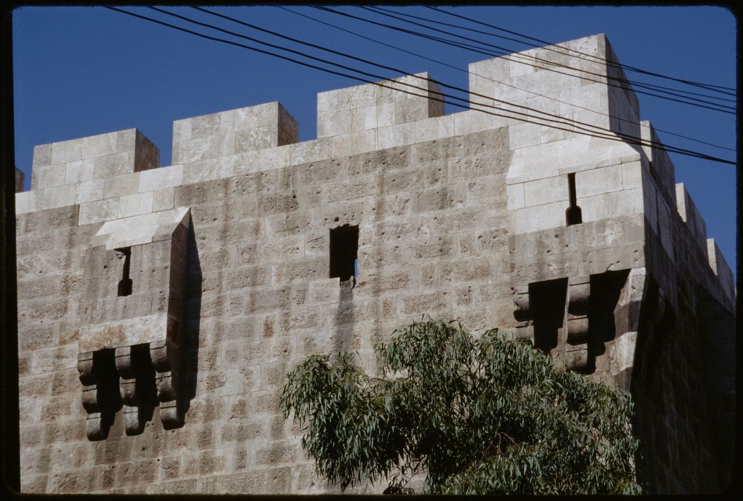 Bab al-Hadid - View of tower with projecting arrow-slit windows.