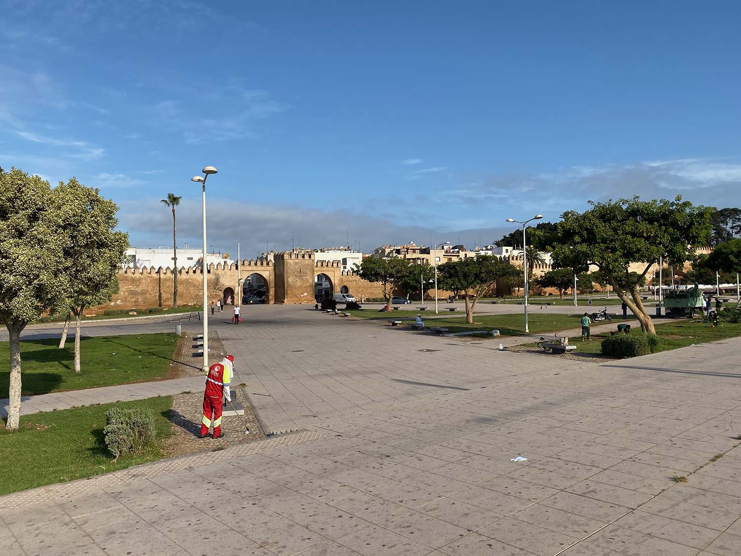 View of the walls and gate of Salé from across the park