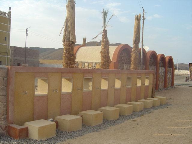 View of ablution wall, designed in a way that the wastewater would overflow to water the surrounding landscape