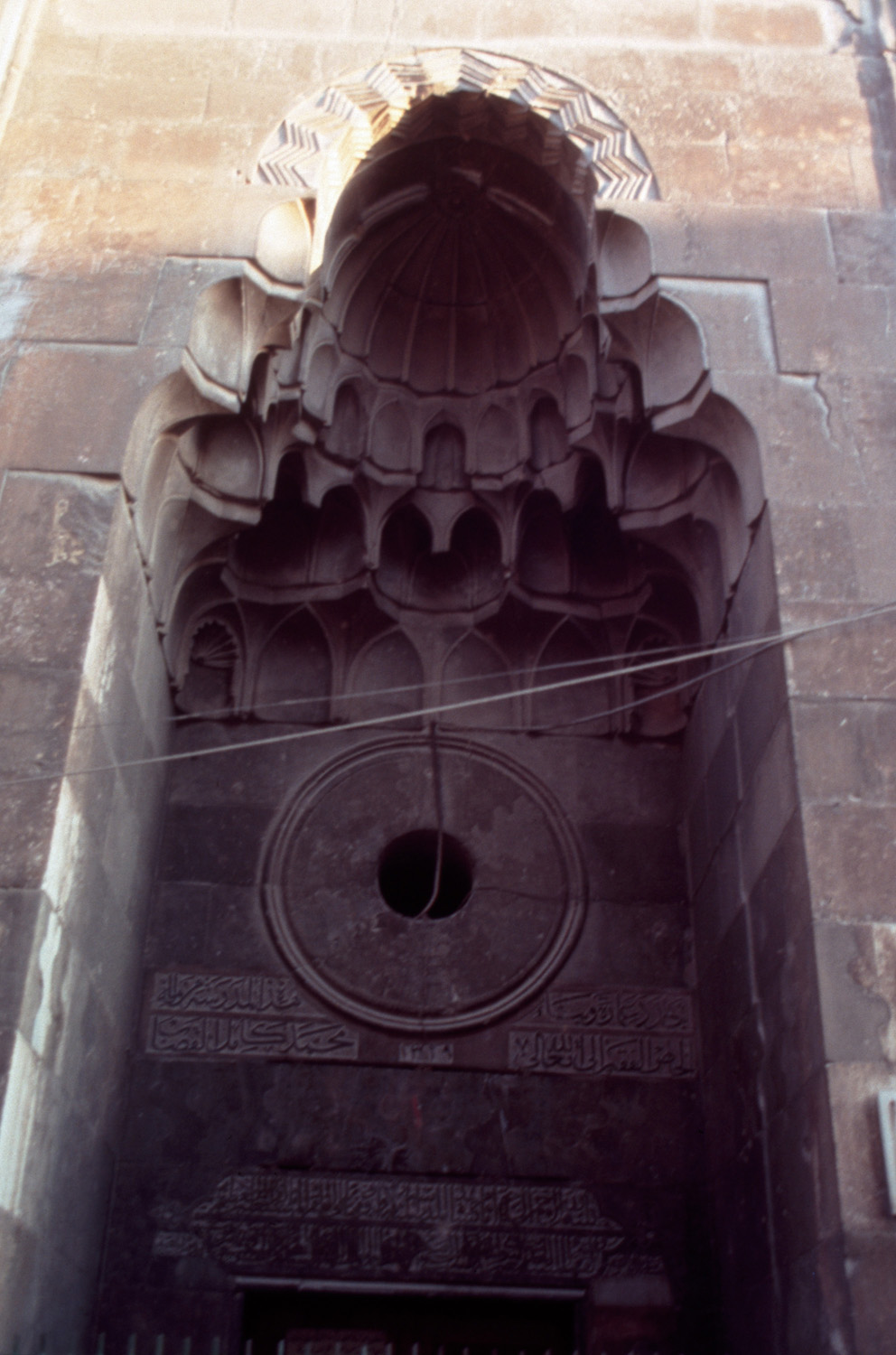 Muqarnas semi dome above portal