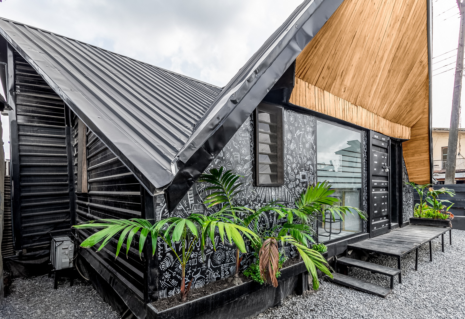 <p>The principally timber structure on concrete foundations is made from local ekki wood, and the design of the roof is drawn from the Japanese art of origami.&nbsp;</p>
