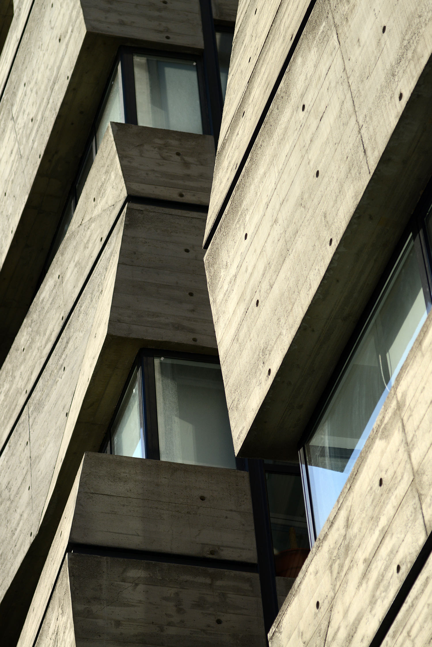 The concrete is used for the structure and the finished facades