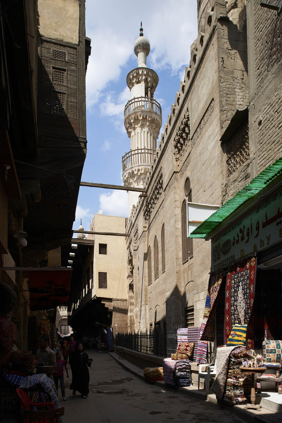 View along street facade, with minaret