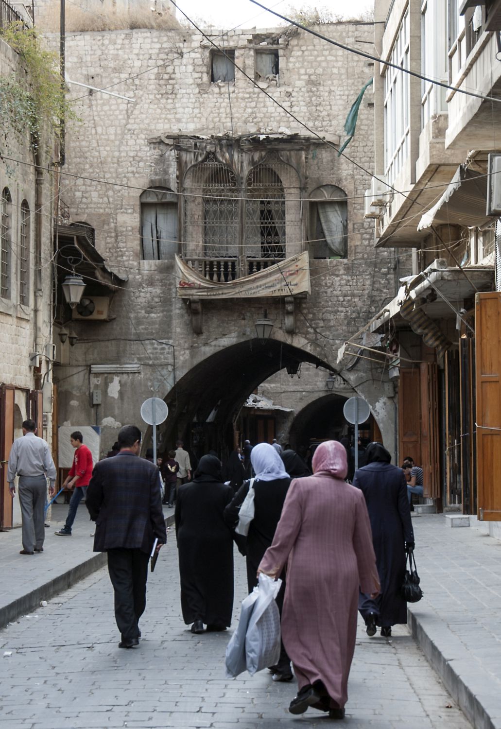 Street with arches in Aleppo, Syria.