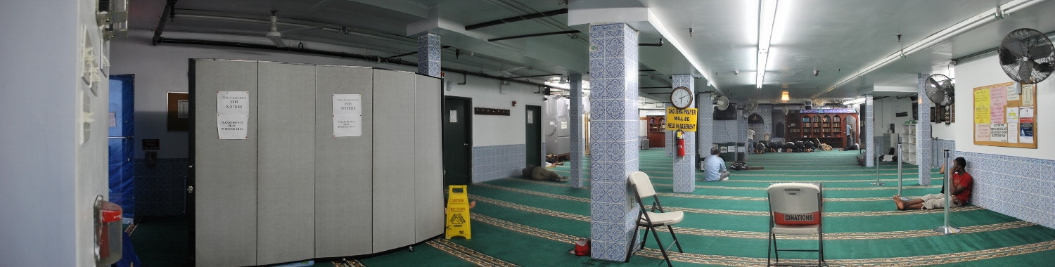 Panoramic view of prayer hall, with women's area at left and qibla wall in distance at right