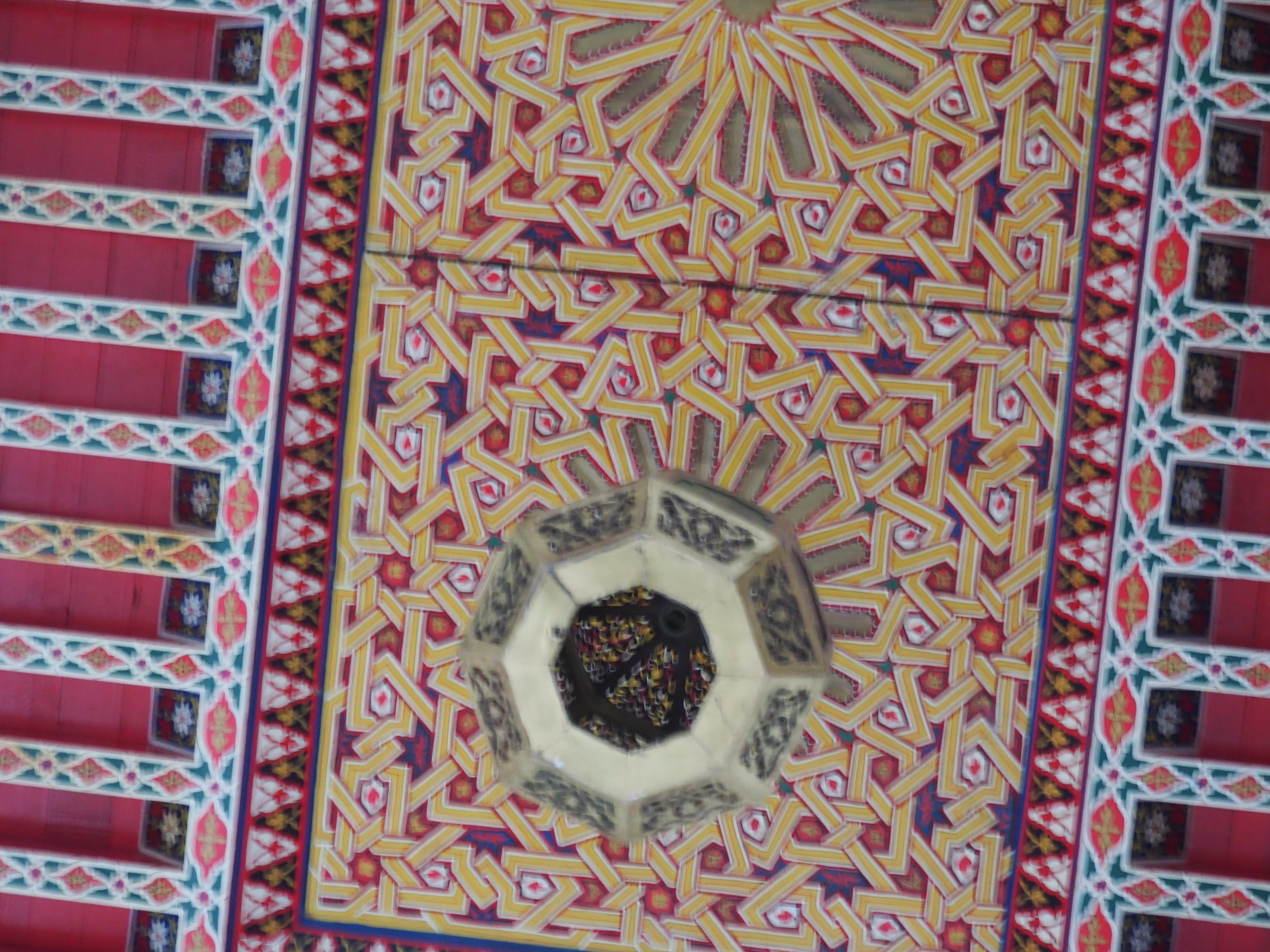 <p>View of the carved wood, painted ceiling</p>