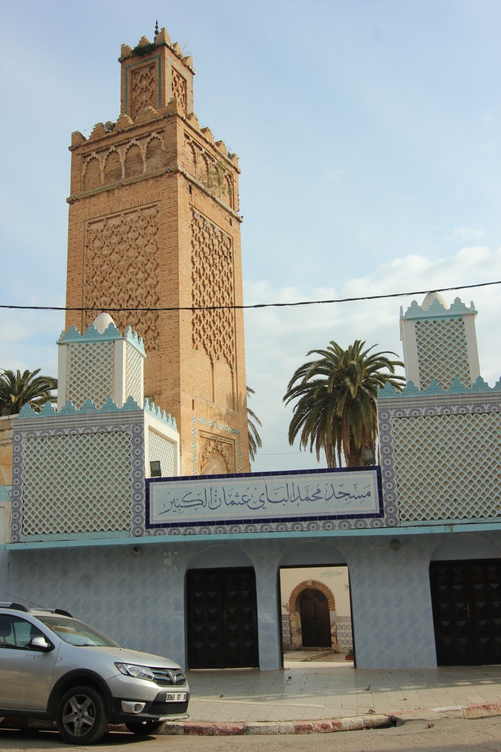 View of the main entrance showing the minaret