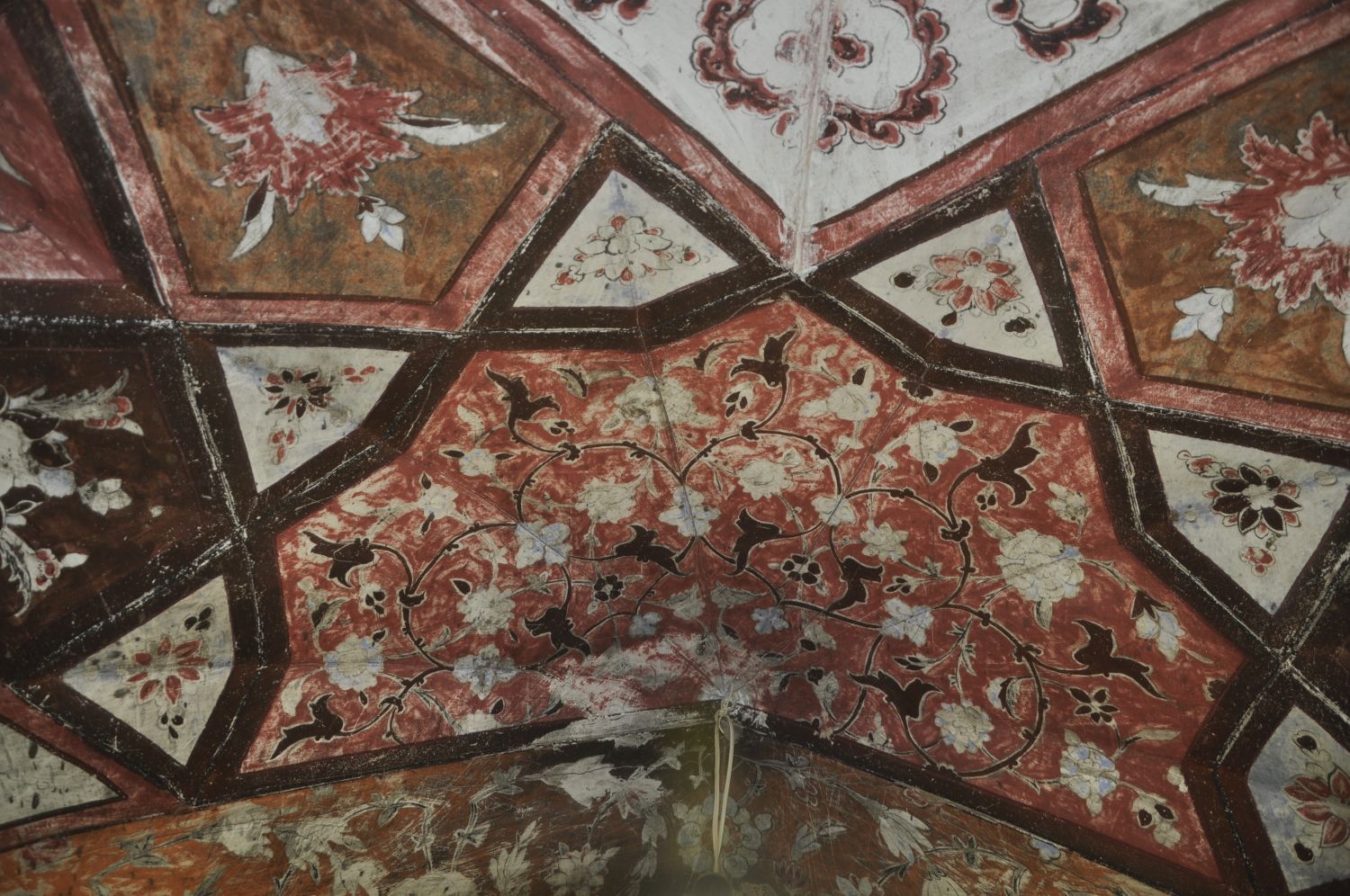 Damaged painting in karbandi.
