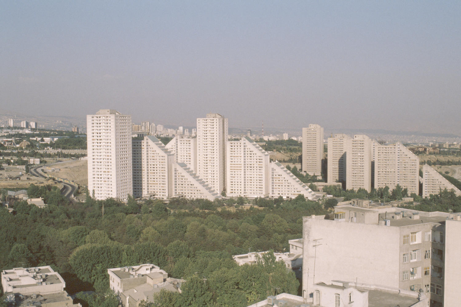 View of complex among cityscape.