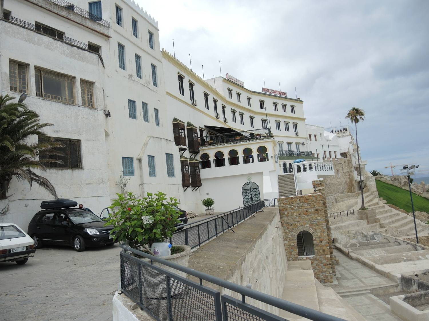Exterior view, Hotel Continental and parking.  The canon battery was once located along where the railing now is.