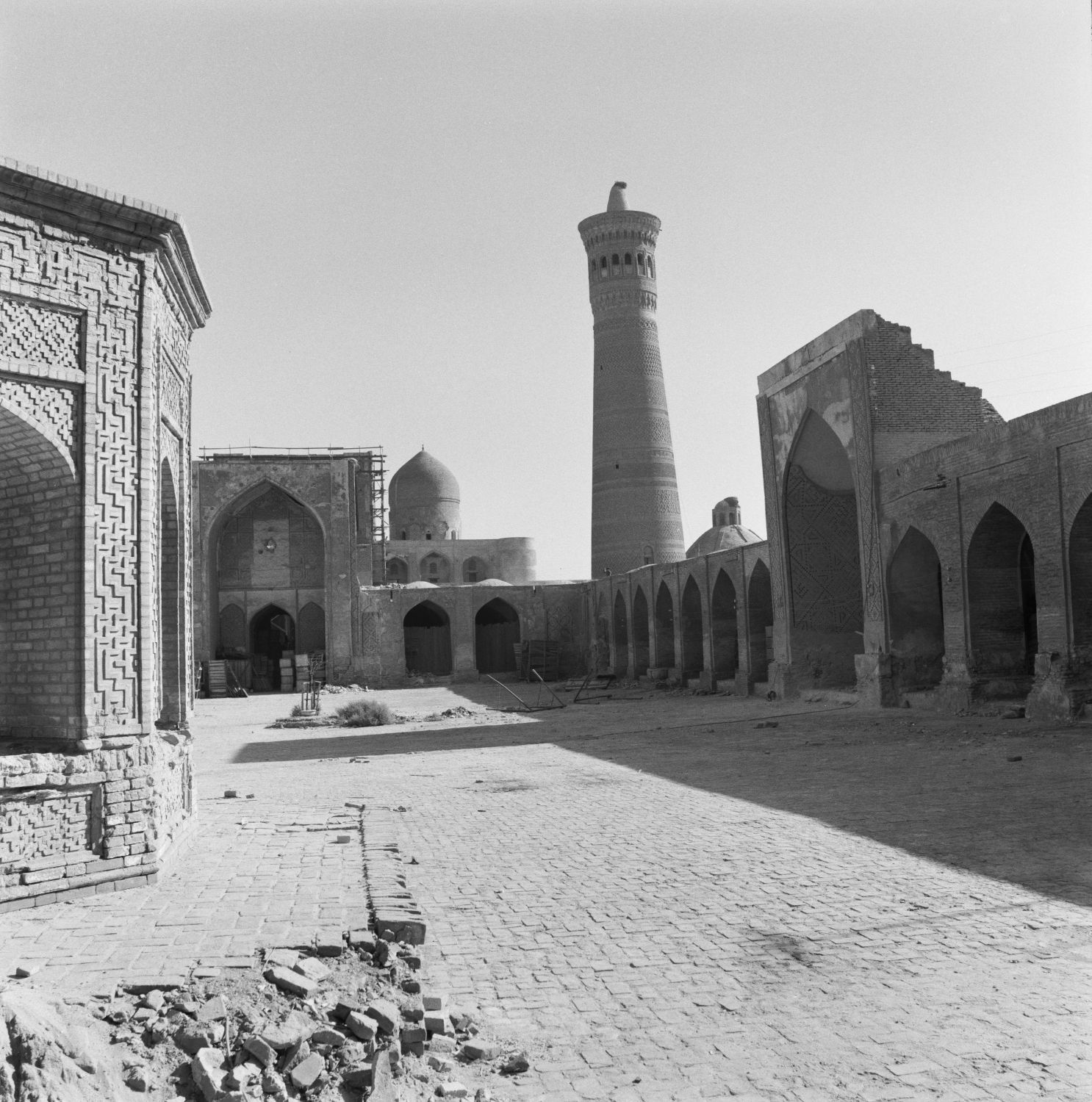 View of the courtyard of Kalan Mosque with minaret in the background