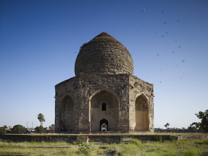 <p>The Mausoleum of Asif Khan sits atop a low plinth</p>