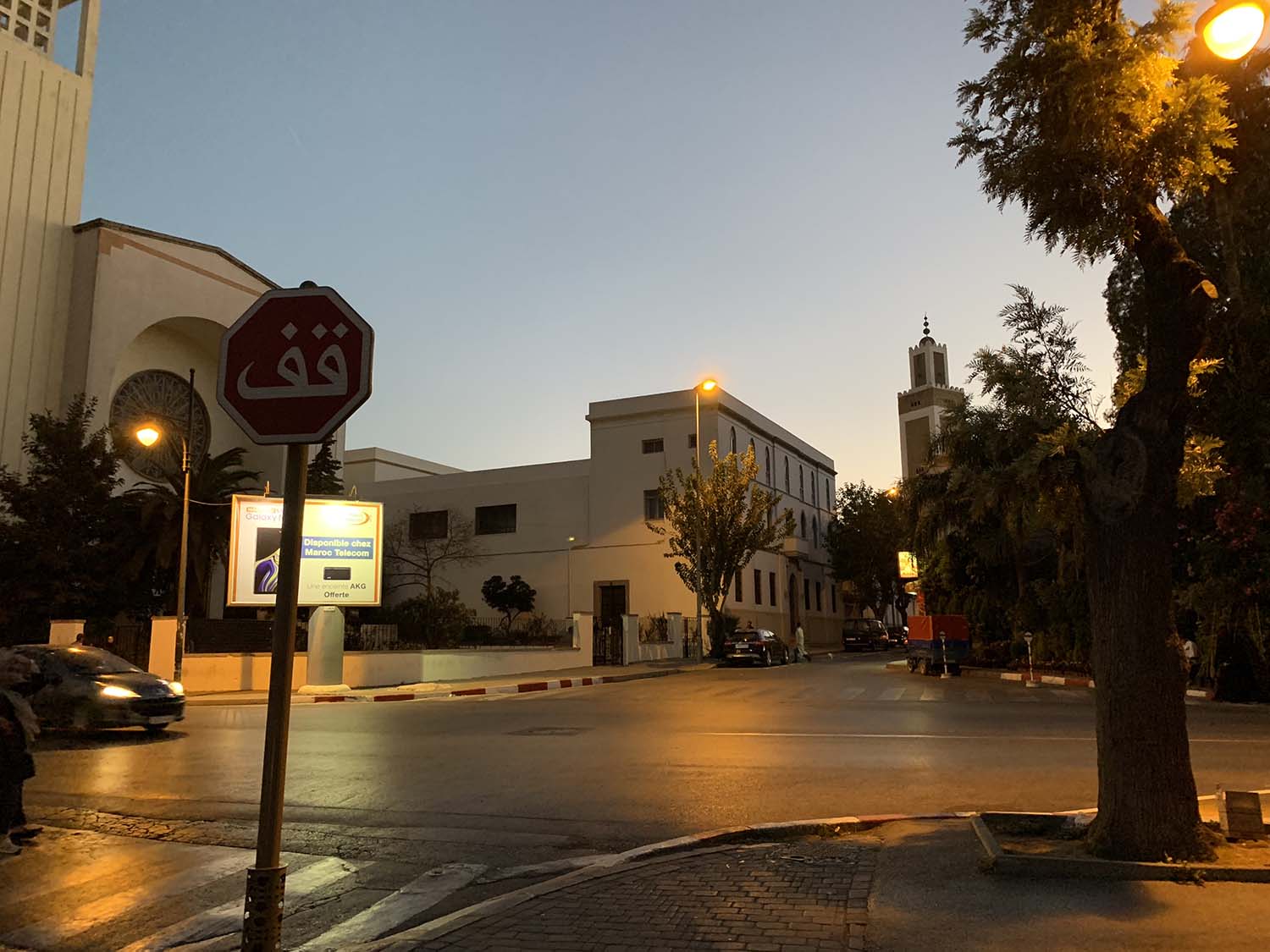 View of street in front of cathedral, past the convent toward Mohammed V Mosque in the distance