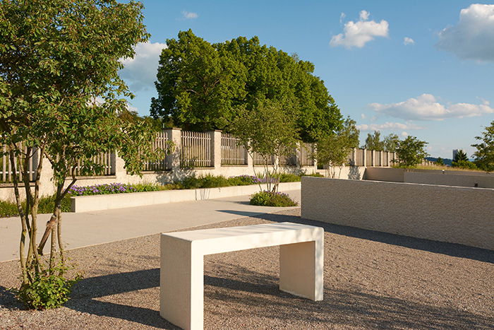Table where the body can be placed for mourners to take their leave of the deceased prior to burial, view to the old cemetry wall