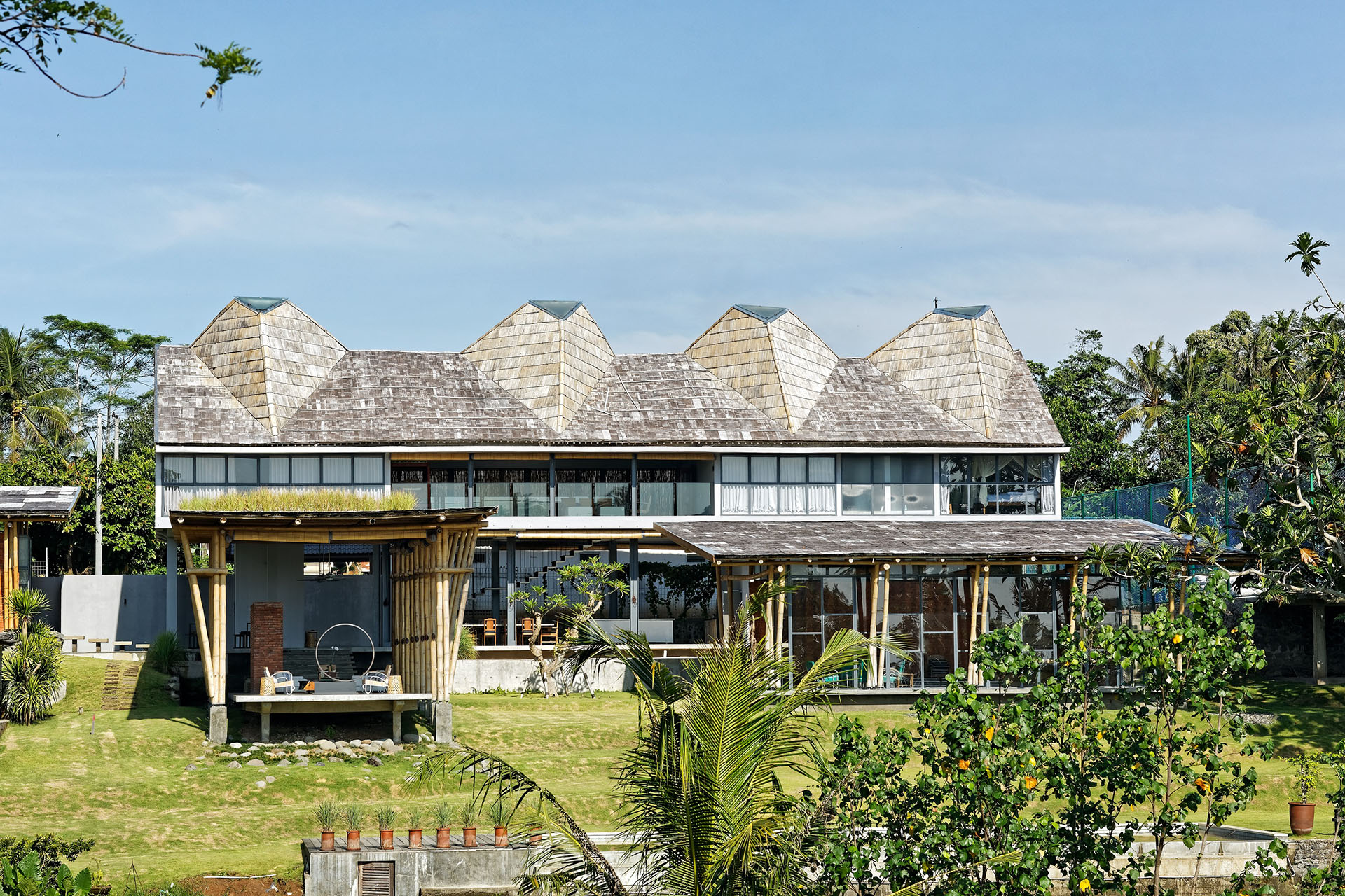 <p>The spatial arrangement of this four-bedroom house revolves around the Balinese architectural concept of Tri Mandala, signifying three realms: Nista Mandala (outermost, least sacred); Madya Mandala (intermediate); and Utama Mandala (innermost, most sacred).</p>