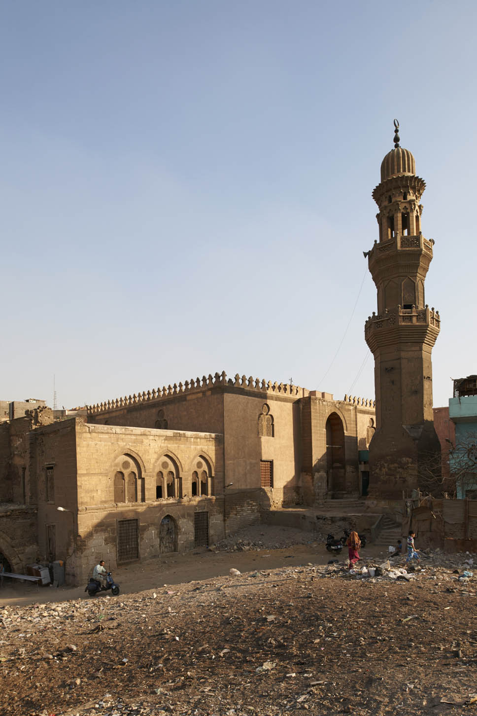 Exterior, view of mosque facade, with freestanding minaret