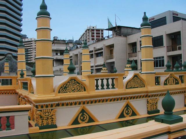 Abdul Gafoor Mosque Restoration and Extension - Restored entrance gate building roof with pillars and balustrade