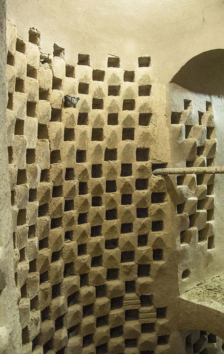 Pigeon tower (kabutarkhanah)&nbsp;in Mardavij Neighborhood of Isfahan, interior view of roosting ledges in a wall.
