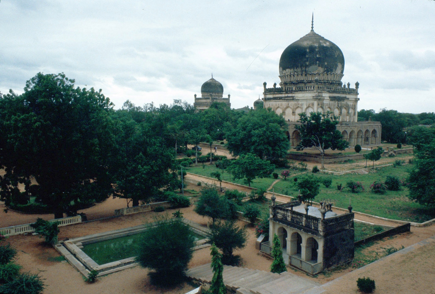 Qutb Shahi Royal Tombs - General view of tombs with surrounding gardens and pool