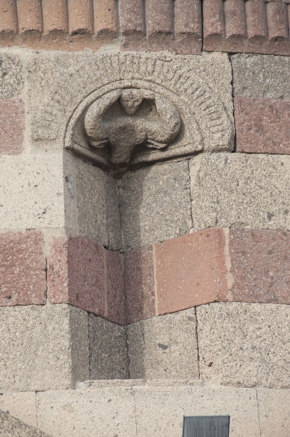 Üç Kümbetler - View of blind v-shaped niche with carved head of bull motif on Emir Saltuk Tomb.