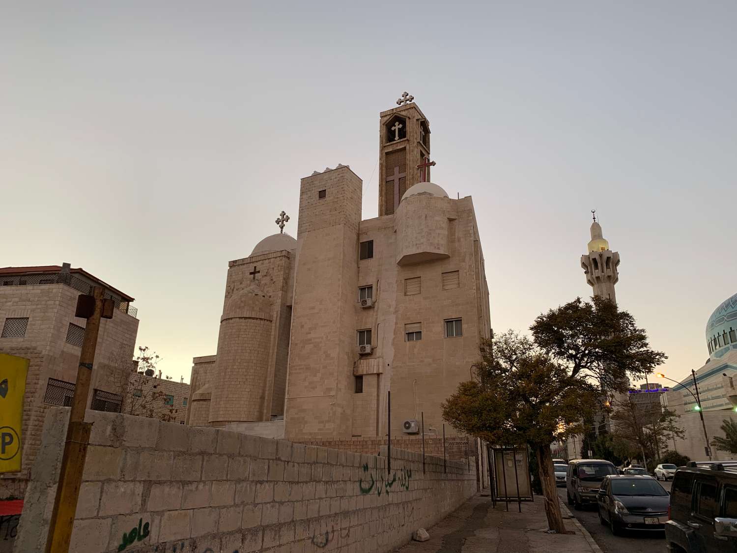 Exterior view of church.&nbsp; King Abdullah I Mosque on the right.<br>