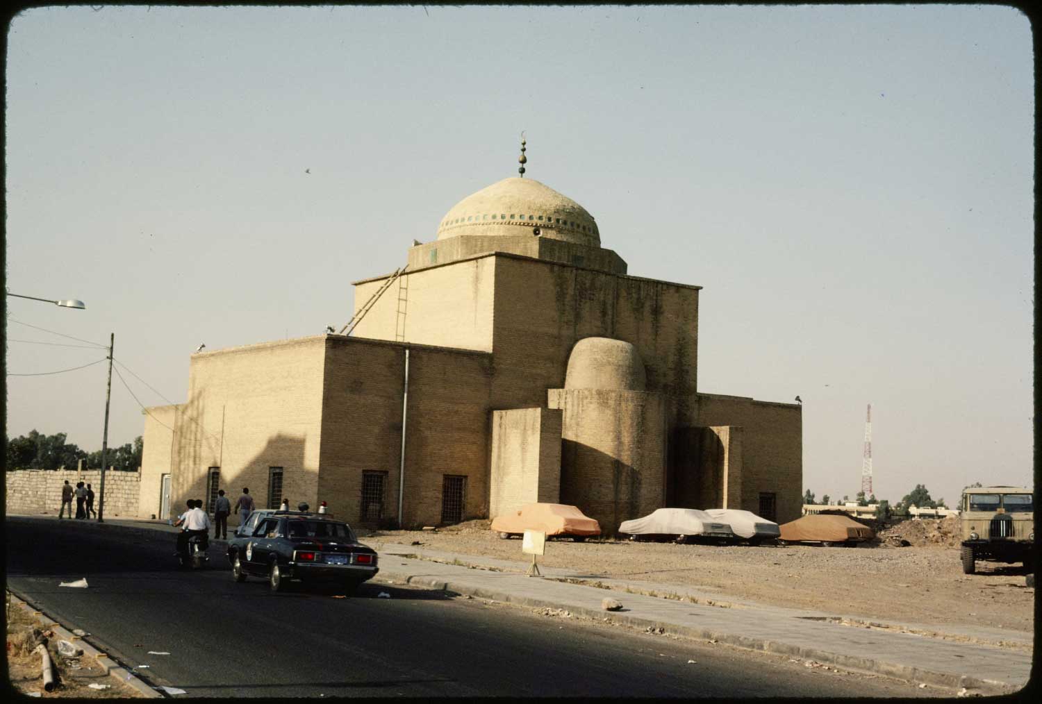 Exterior view of mosque, showing back of qibla wall.