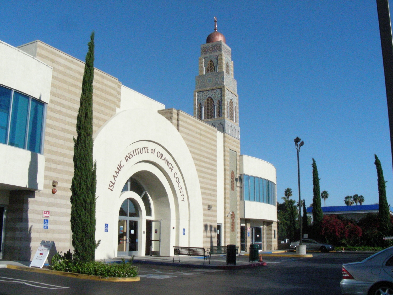 Exterior view, entrance facade with minaret