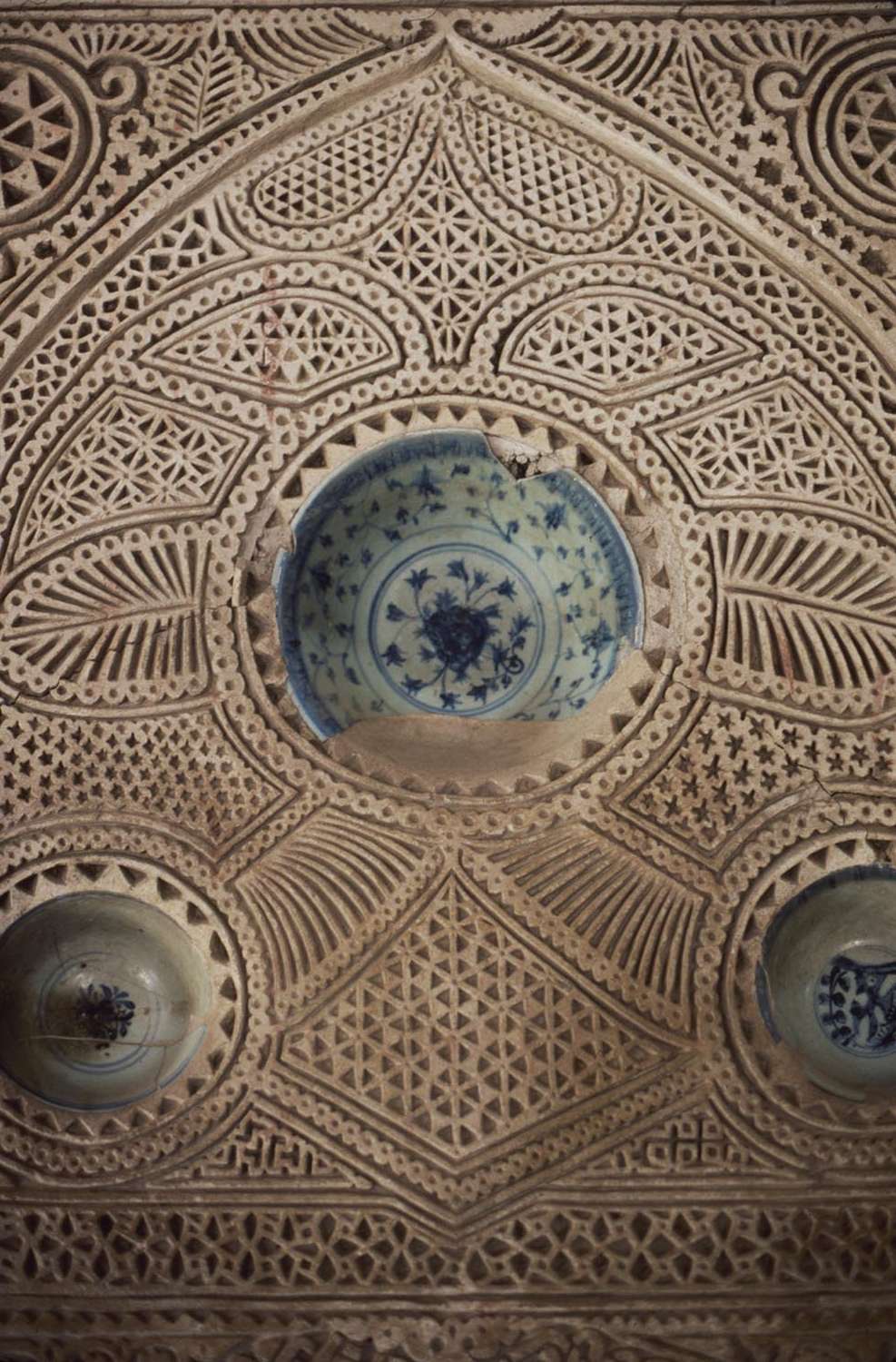 Detail of mihrab showing inset ceramic blue-on-white bowls.