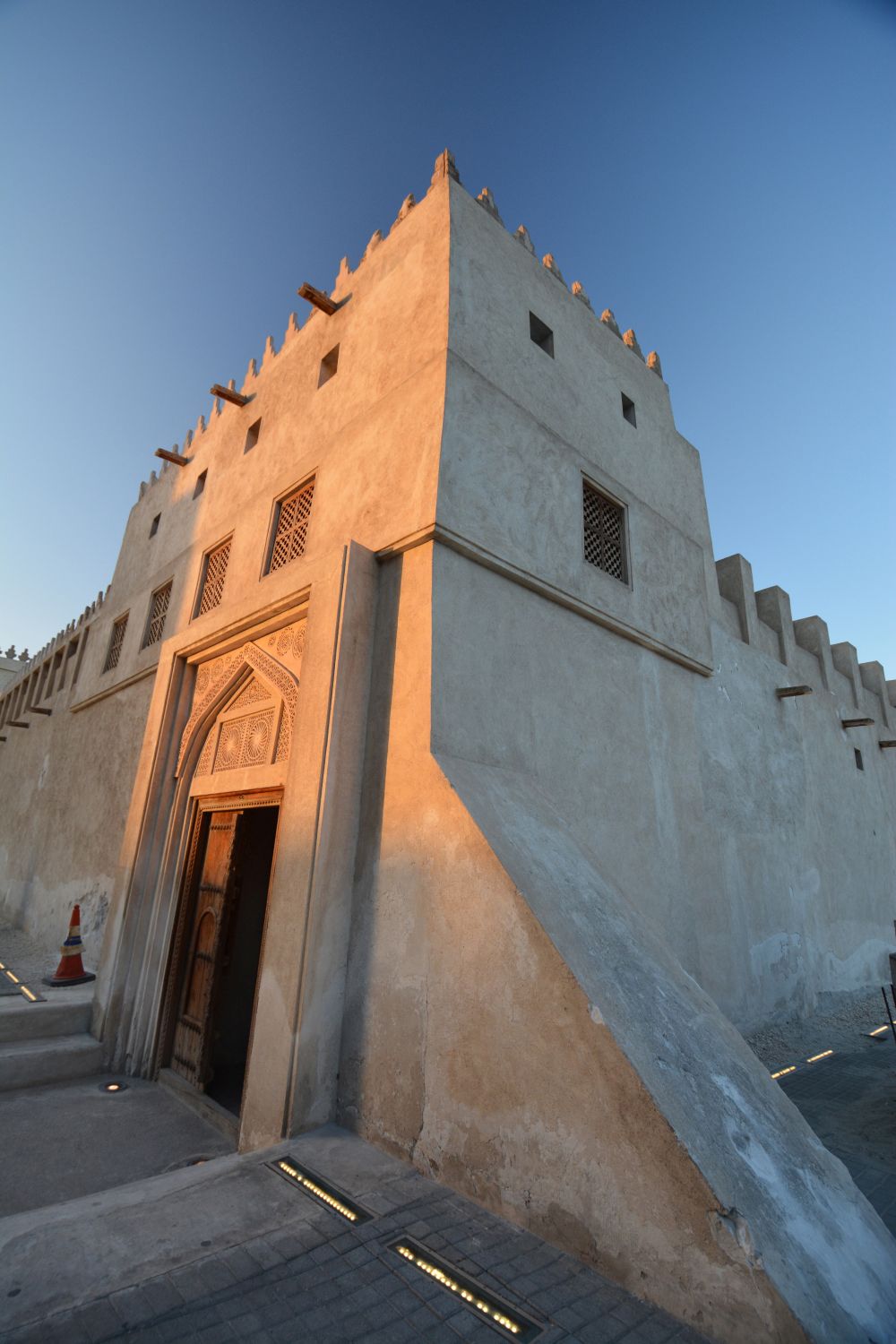 Alternate exterior view of a building in Muharraq, showing the entryway.