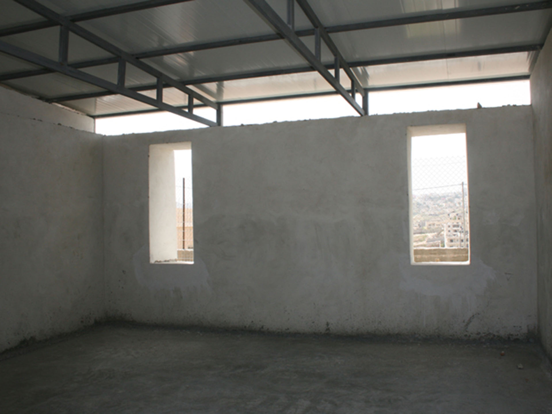 <p>This school serves 123 students of the Jahalin Bedouin community who were relocated from their villages by the Israeli Authority to this peripheral former village, cut off from East Jerusalem by the Separation Barrier.</p>