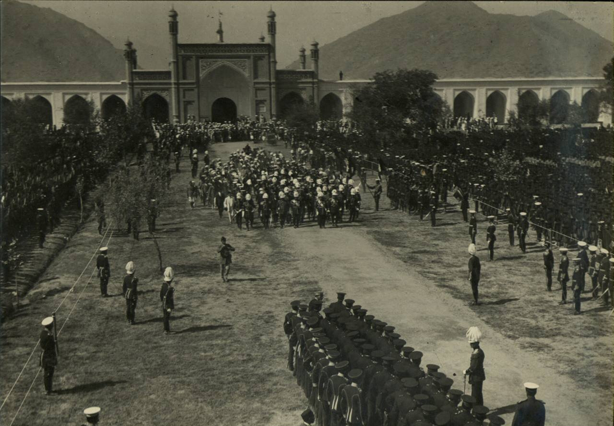 The Afghan National Army marches in fomation in the mosque courtyard