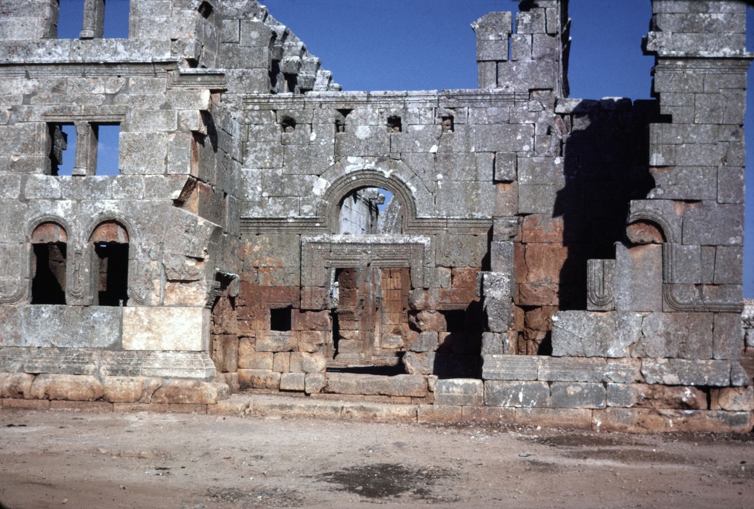 Exterior view of west facade, showing remnants of main portal.