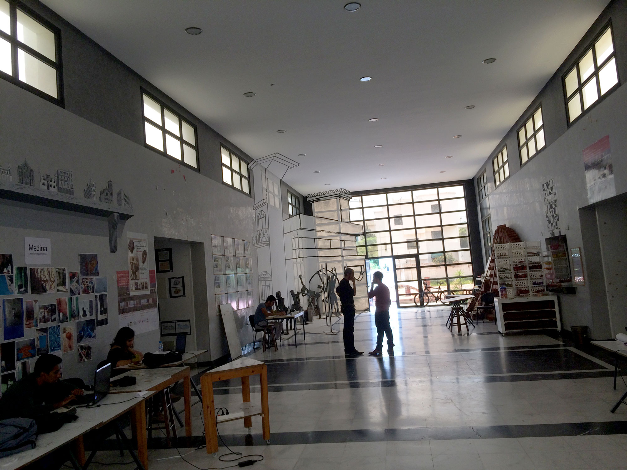 Ecole Nationale d'Architecture de Tétouan - <p>Interior view of entrance hallway with student work being exhibited</p>