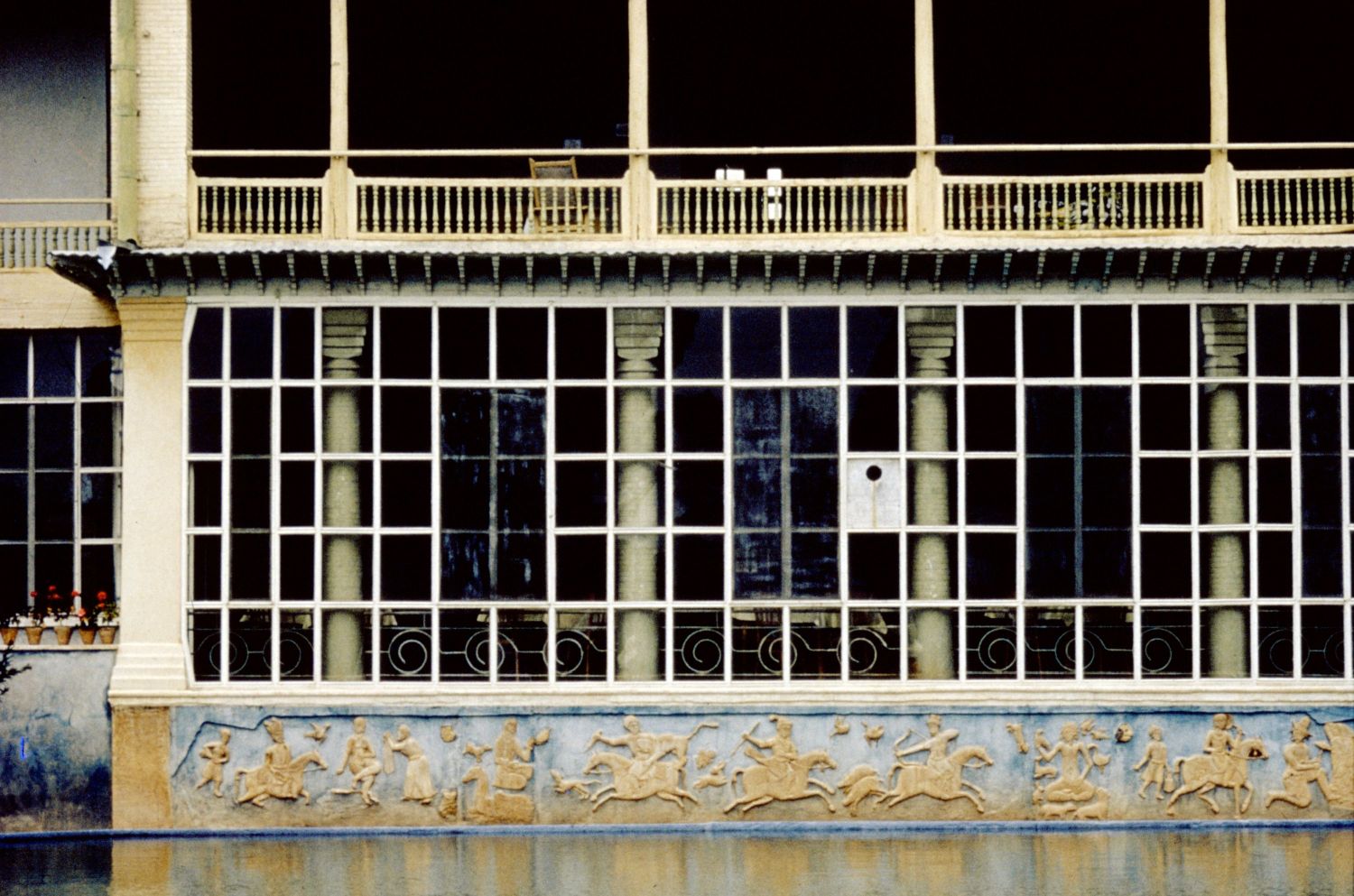 Detail  view of façade and reflection pool.