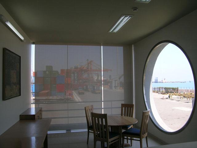 View of a typical head of department office with a port hole window overlooking the key cranes and ships berth
