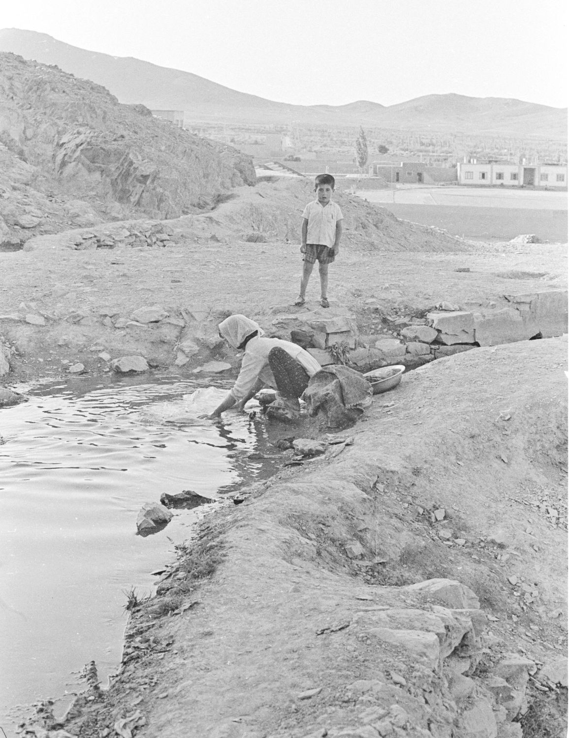 Dennis Briskin - Washing clothes in a brook in Arak, Iran.