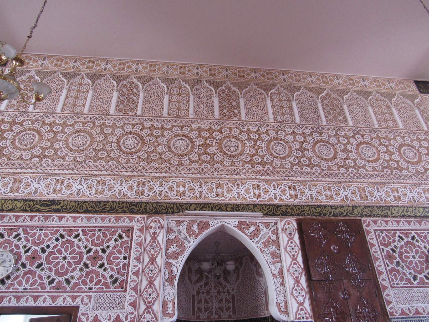 Interior view, toward stucco decorations above the mihrab