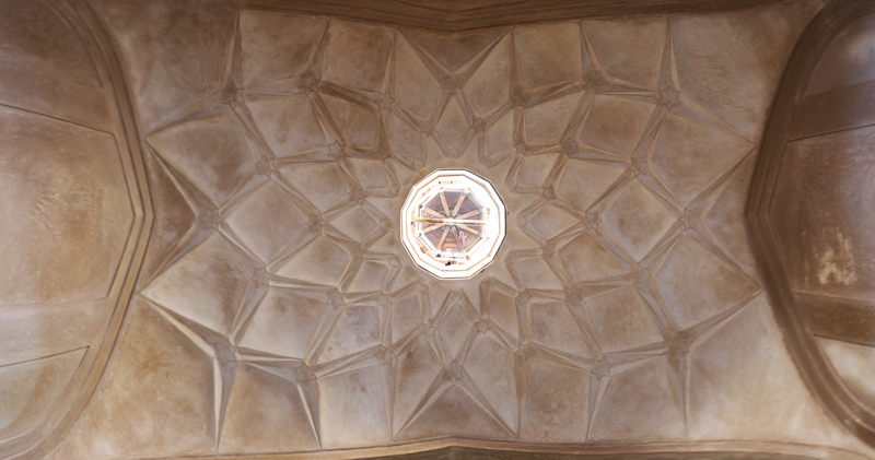 View up to muqarnas ceiling and skylight