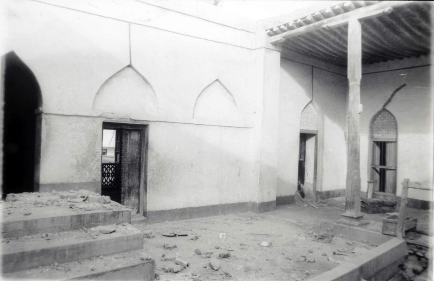 <p>View of original wood portico and walls seen pre-restoration</p>