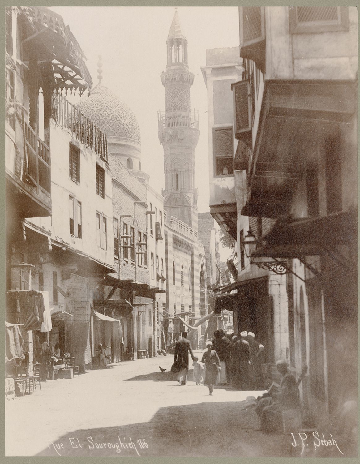 View along Surujiyya Street in Cairo, Egypt. The Funerary Complex of Amir Ghanim al-Bahlawan is visible in background.