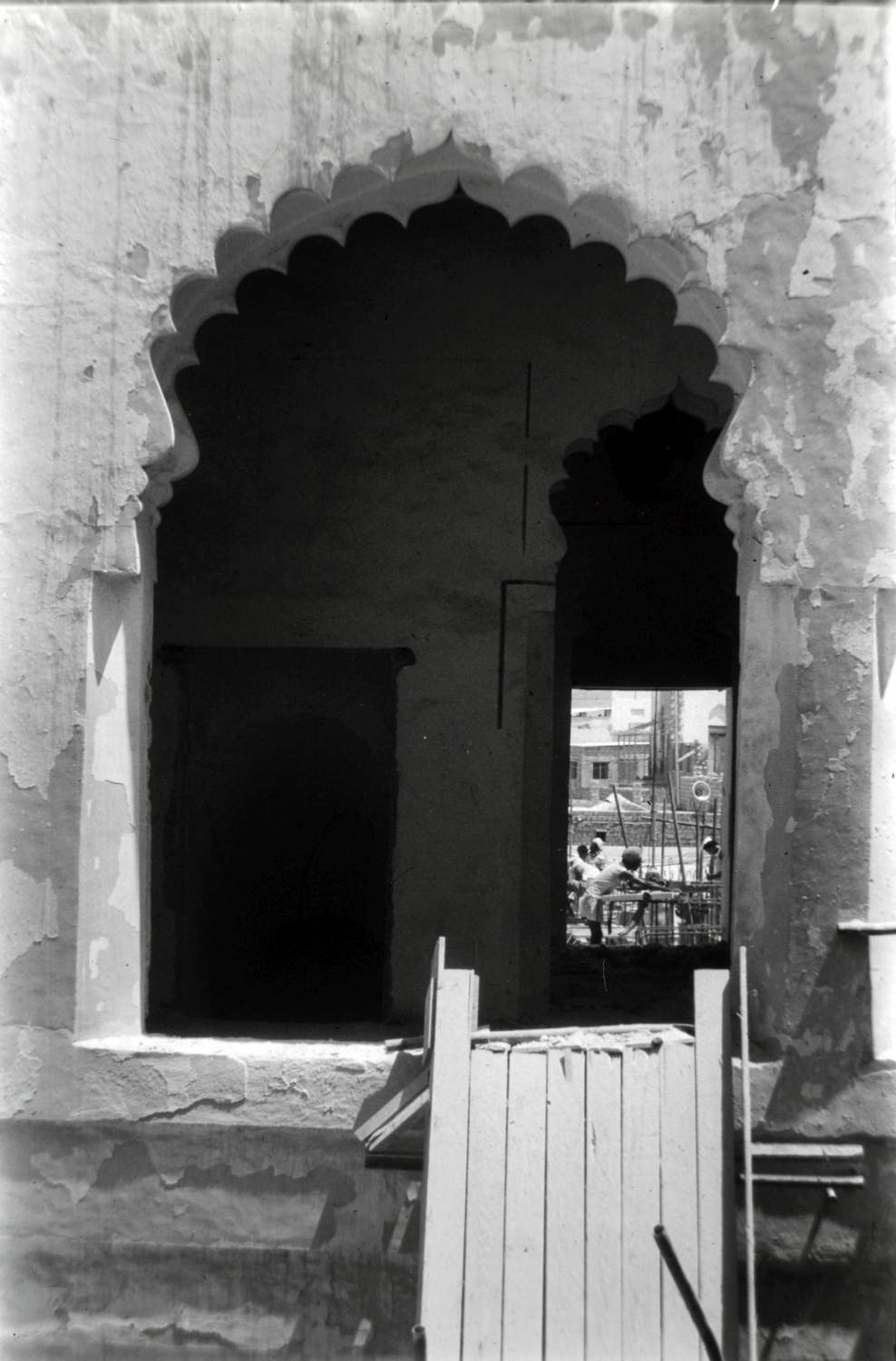 <p> View of one of the original cusped arch windows, pre-reconstruction</p>