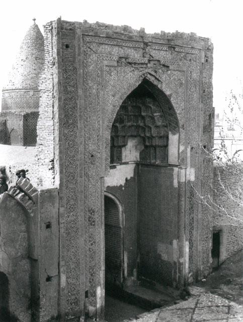 Exterior view of the entrance iwan with muqarnas hood, looking northwest