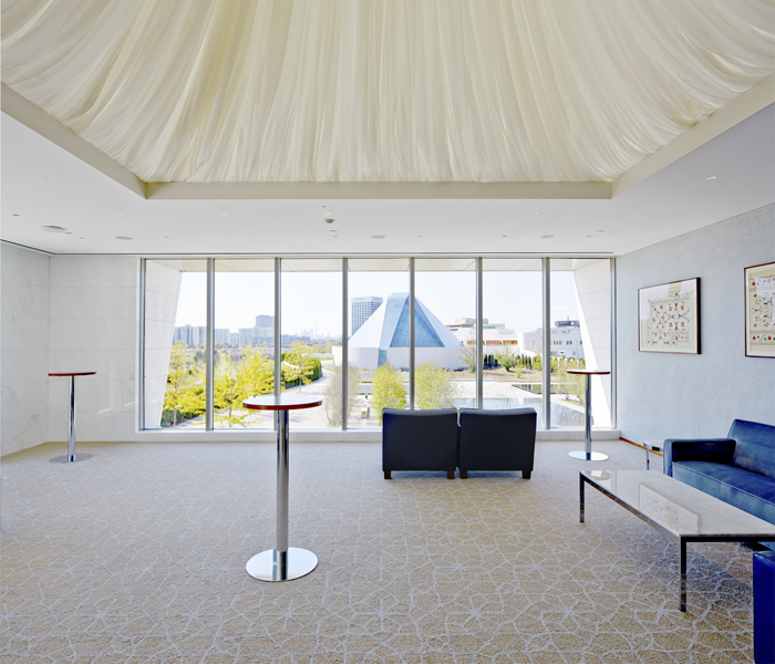 Interior, patron's lounge showing view across the garden to the Ismaili Centre
