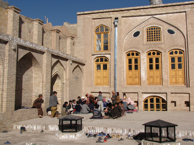 <p>A class session takes place in the courtyard after restoration</p>