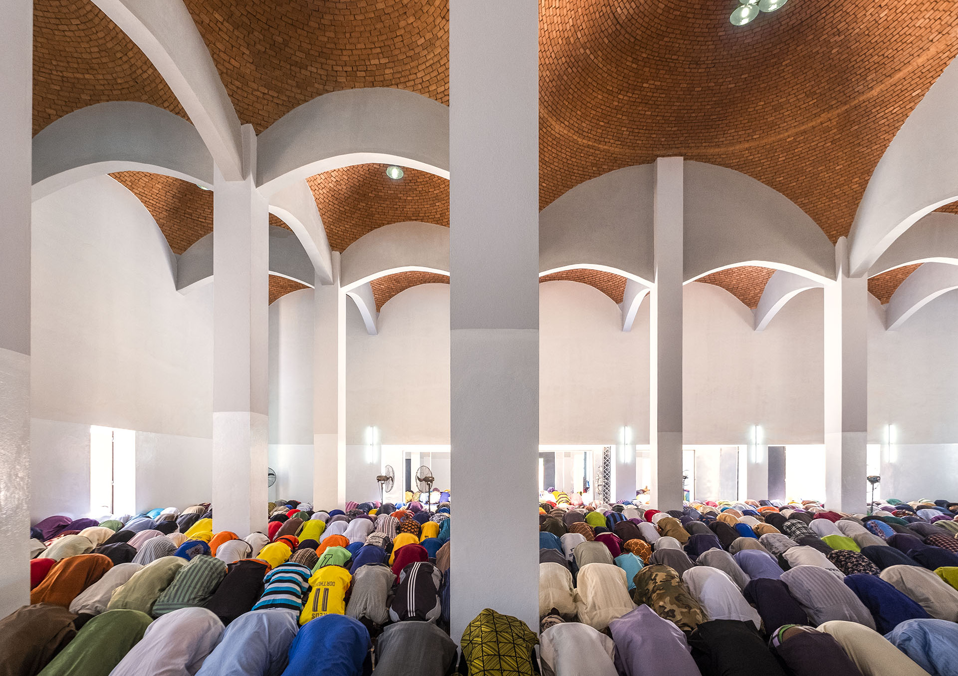 <p>Interior, praying at the mosque</p>