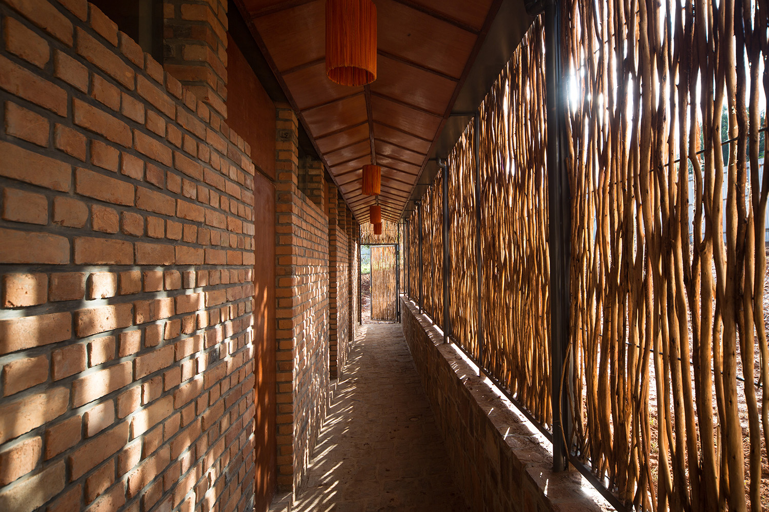Eucalyptus screen creates privacy along bedroom corridor