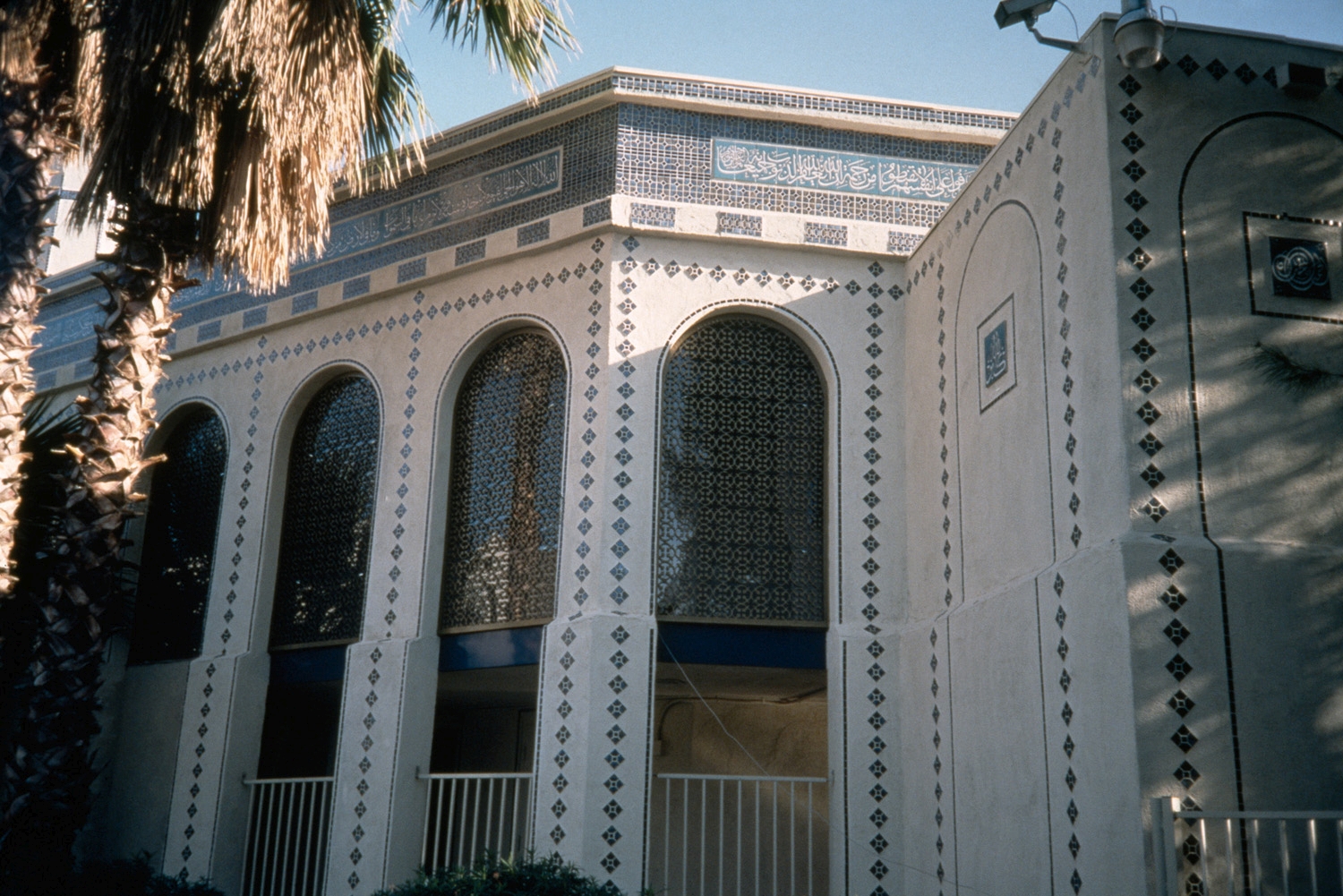 Islamic Community Center of Tempe - Exterior detail, with tile calligraphy bands and arches with lattice screens