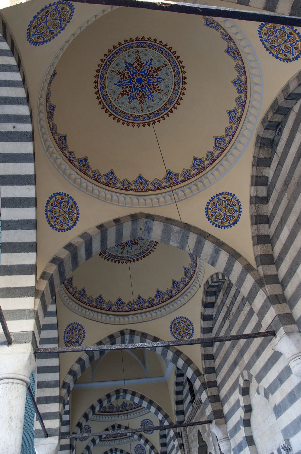 View of interior of portico showing domes above inner bays.